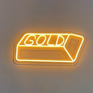 Neon gold bar sign glowing on a wall